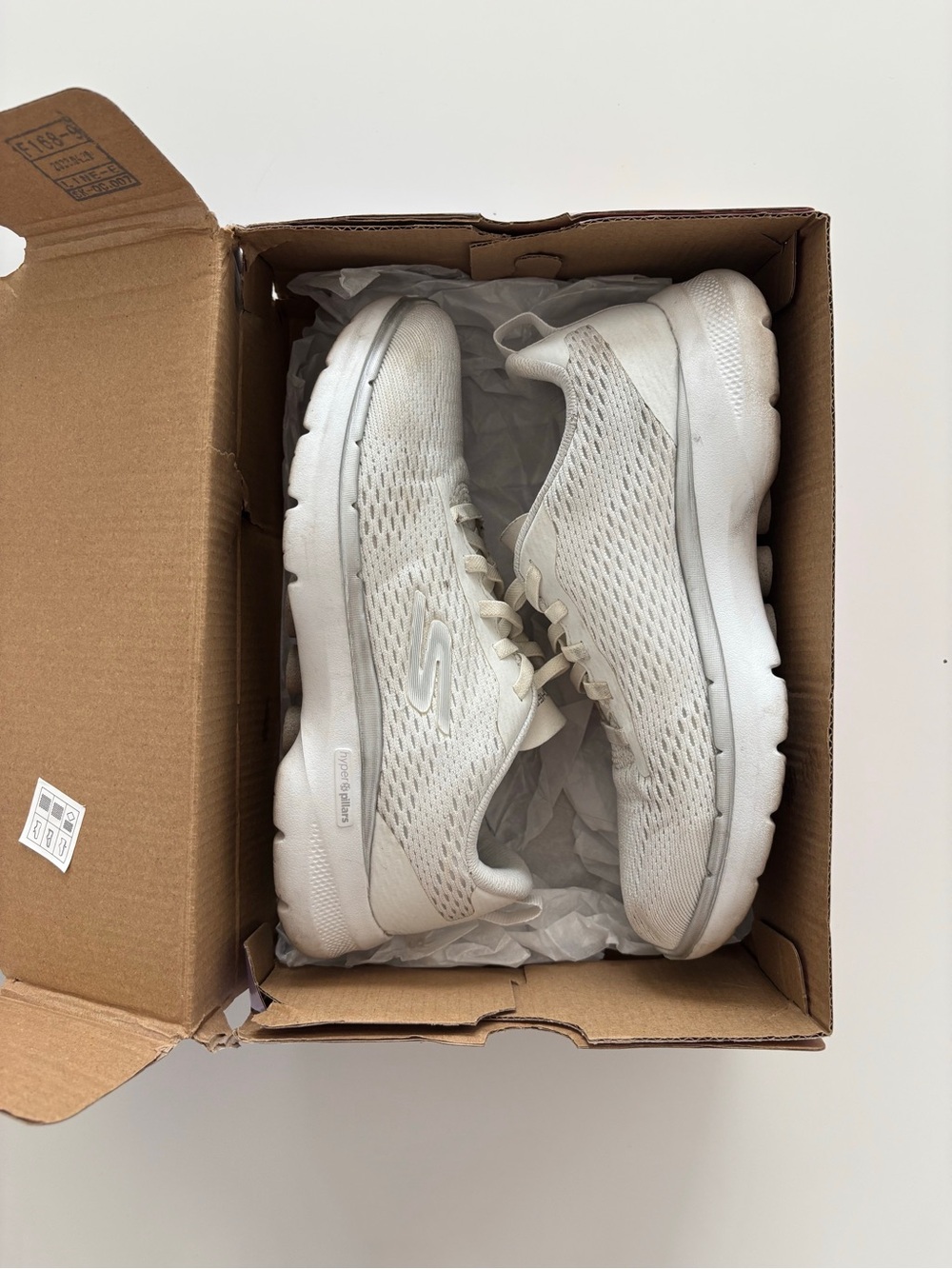 White Skechers Go Walk running shoes